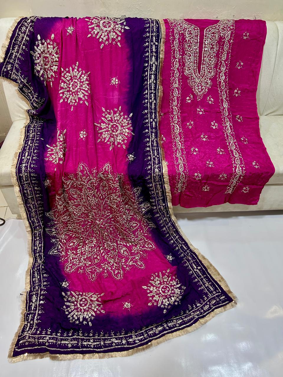 Fuchsia and purple unstitched embroidered dress material