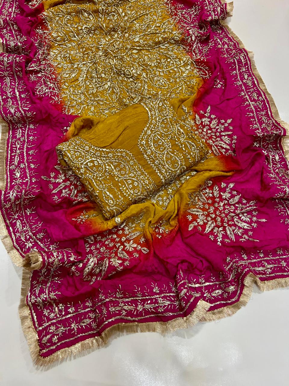 Mustard and fuchsia unstitched embroidered dress material