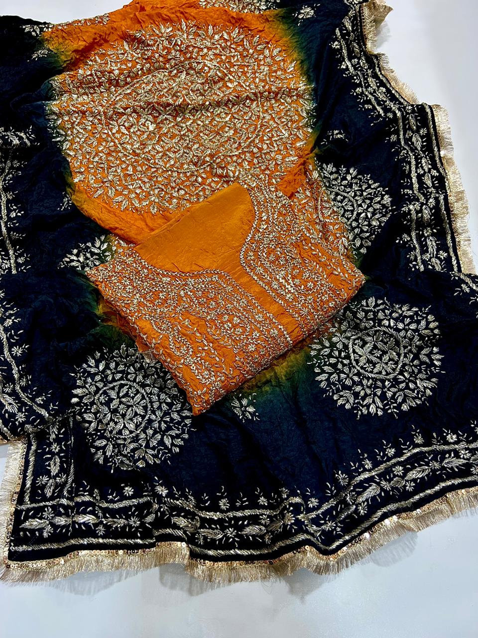 Orange and navy unstitched embroidered dress material
